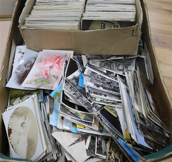 Two boxes of mixed postcards